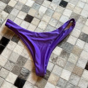 Purple swim shorts, cheeky